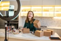 Young beautician. Long-haired cute beaitician conducting an online beauty workshop