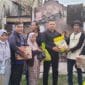 Penyerahan bantuan kepada warga korban kebakaran di Kelurahan Padang Sarai.