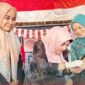 Cegah Stunting, Maria Feronika Salurkan Asupan Gizi Balita di Pasar Usang