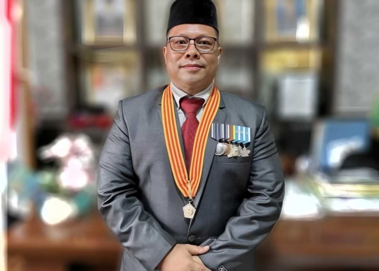 Kepala MAN 1 Kota Padang, Afrizal.