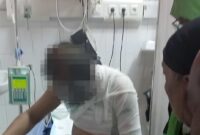 Pengemudi ojek online Stevens Charles Ricky menjalani perawatan di RSUD dr. Mohammad Zyn, karena mengalami luka bakar serius dalam aksi pembegalan. (Ist.)