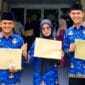 Tiga tenaga honorer MAN 3 Padang, Hidayat, Widya, dan Miftahul Qalbi, resmi dilantik sebagai ASN PPPK Formasi 2024 di Aula Amal Bakti Kanwil Kemenag Sumbar, Kamis (23/10/2025). (Ist.)