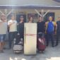 Personel Satreskrim Polres Pasaman Barat mengamankan pasutri pelaku pencurian, dengan barang bukti satu unit kulkas silver. (Ist.)