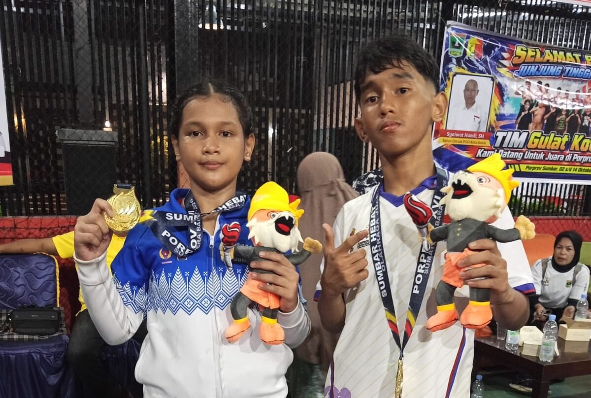 Si kembar kenzi dan naura persembahkan emas bagi kontingen kota padang